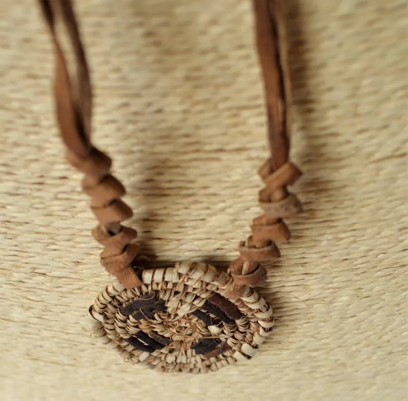 African necklace from natural leather and palm straw