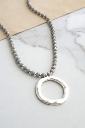 Gray Beaded Necklace with Silver Circle Pendant