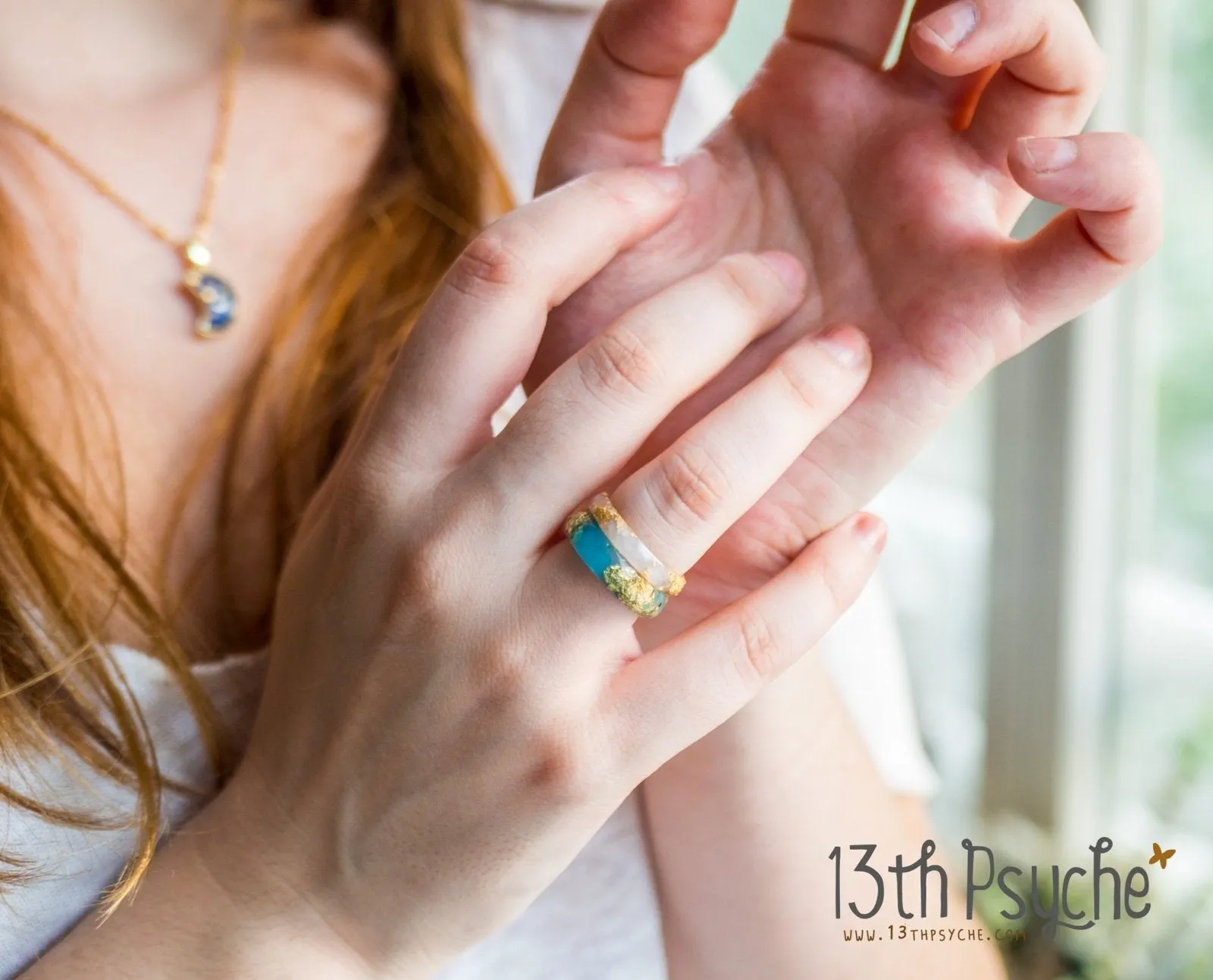 Light blue and gold flakes faceted resin ring